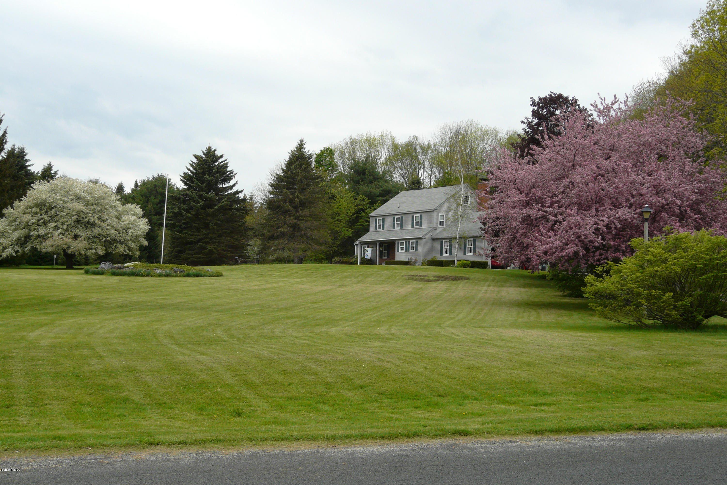 151 Old Post Road Richmond, MA 01201 - Photo 18 of 39 a view of a house with a big yard