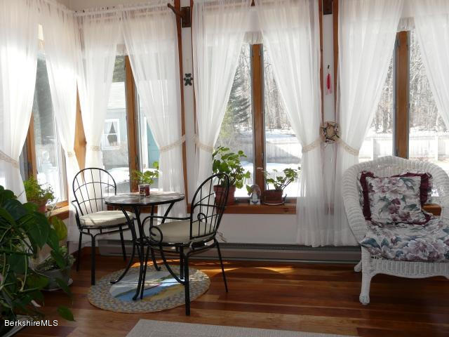151 Old Post Road Richmond, MA 01201 - Photo 3 of 39 a view of a dining room with furniture and window