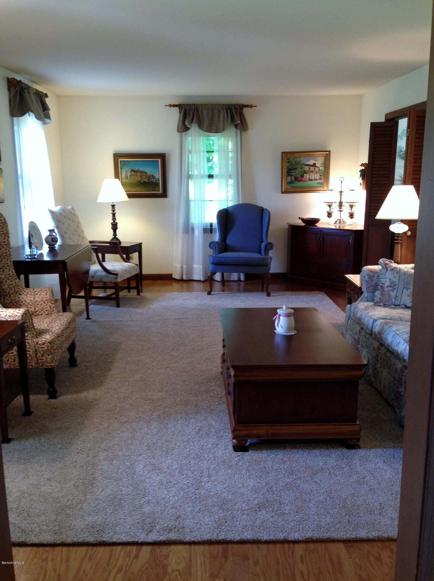 151 Old Post Road Richmond, MA 01201 - Photo 27 of 39 a living room with furniture and a flat screen tv