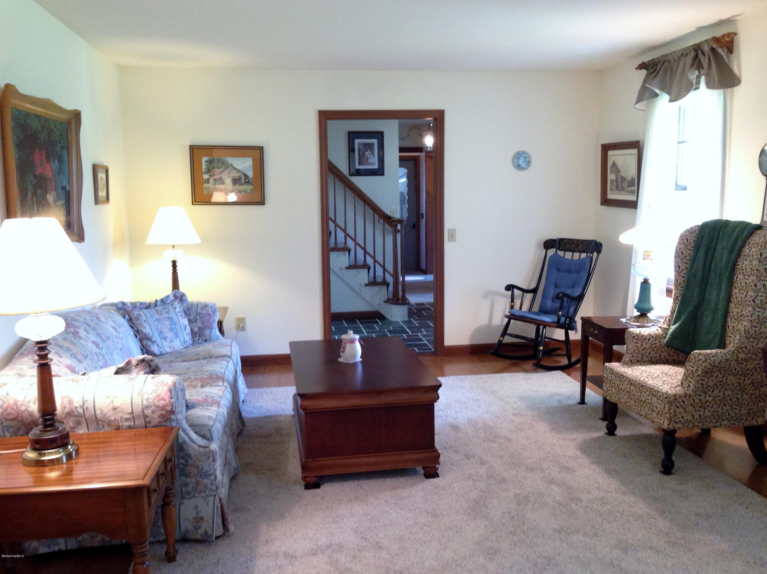151 Old Post Road Richmond, MA 01201 - Photo 29 of 39 a living room with furniture and a chair