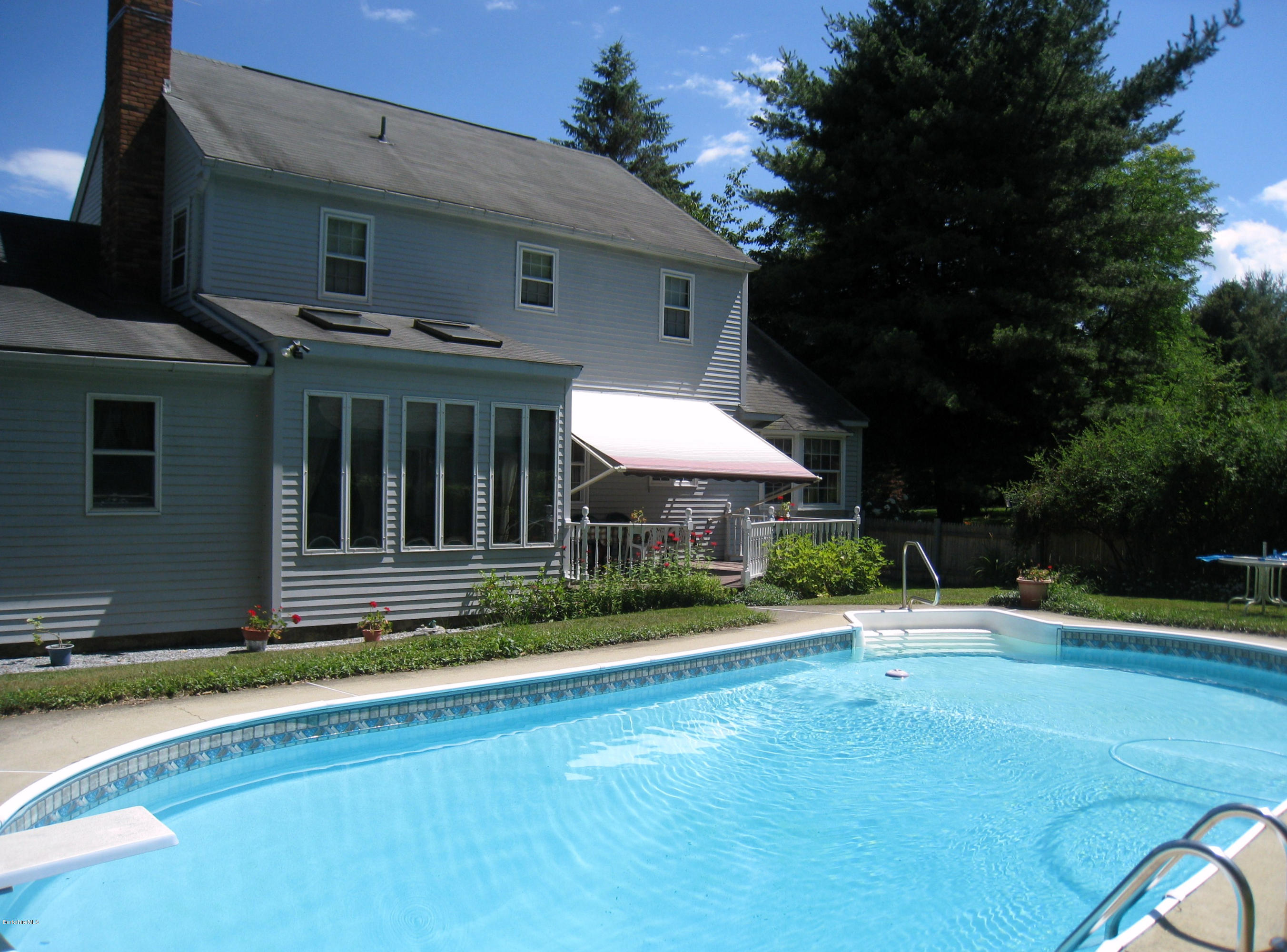151 Old Post Road Richmond, MA 01201 - Photo 4 of 39 a view of a house with a swimming pool