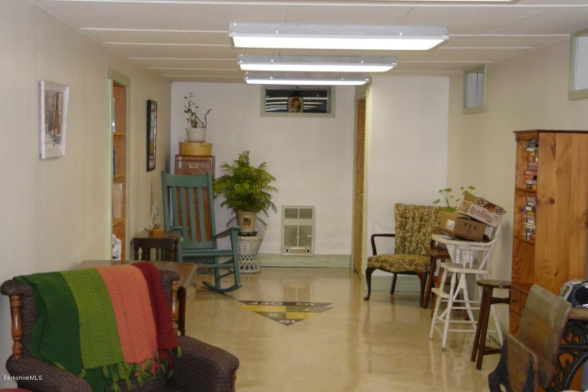 151 Old Post Road Richmond, MA 01201 - Photo 34 of 39 a living room with furniture and a potted plant