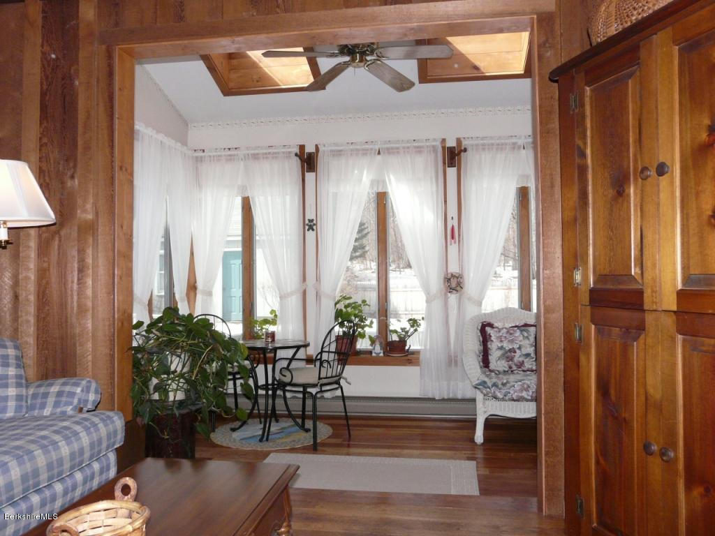 151 Old Post Road Richmond, MA 01201 - Photo 35 of 39 a living room with furniture and large windows