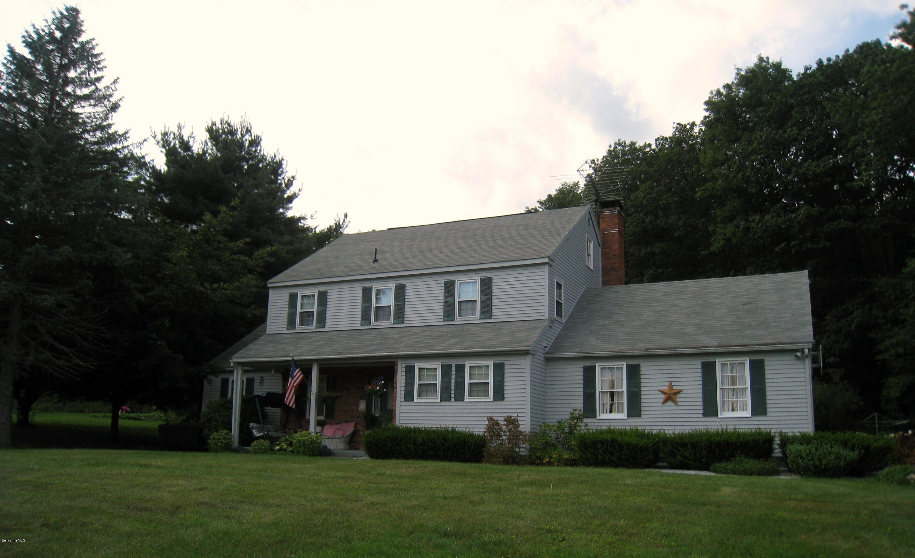 151 Old Post Road Richmond, MA 01201 - Photo 38 of 39 a front view of a house with a garden