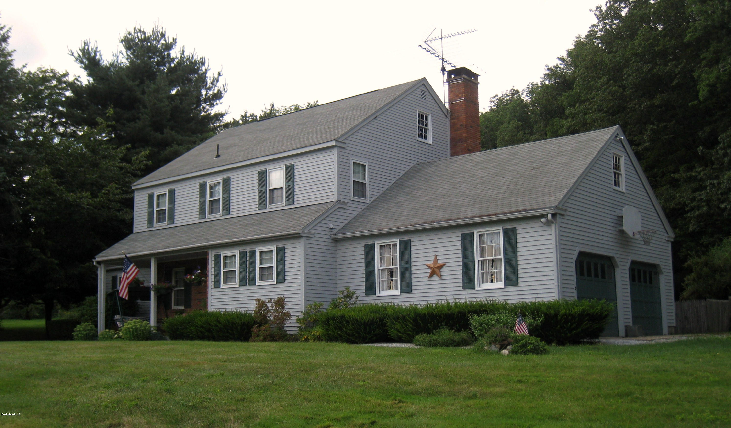 151 Old Post Road Richmond, MA 01201 - Photo 39 of 39 a front view of a house with a yard