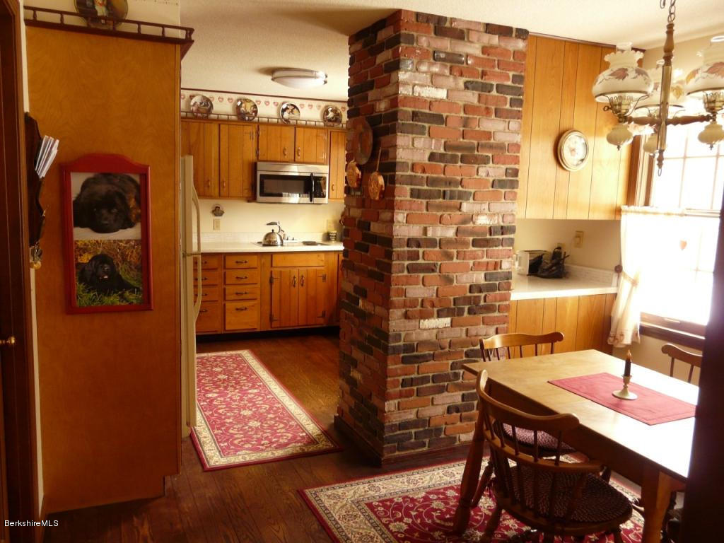151 Old Post Road Richmond, MA 01201 - Photo 6 of 39 view of a room with a table and chairs