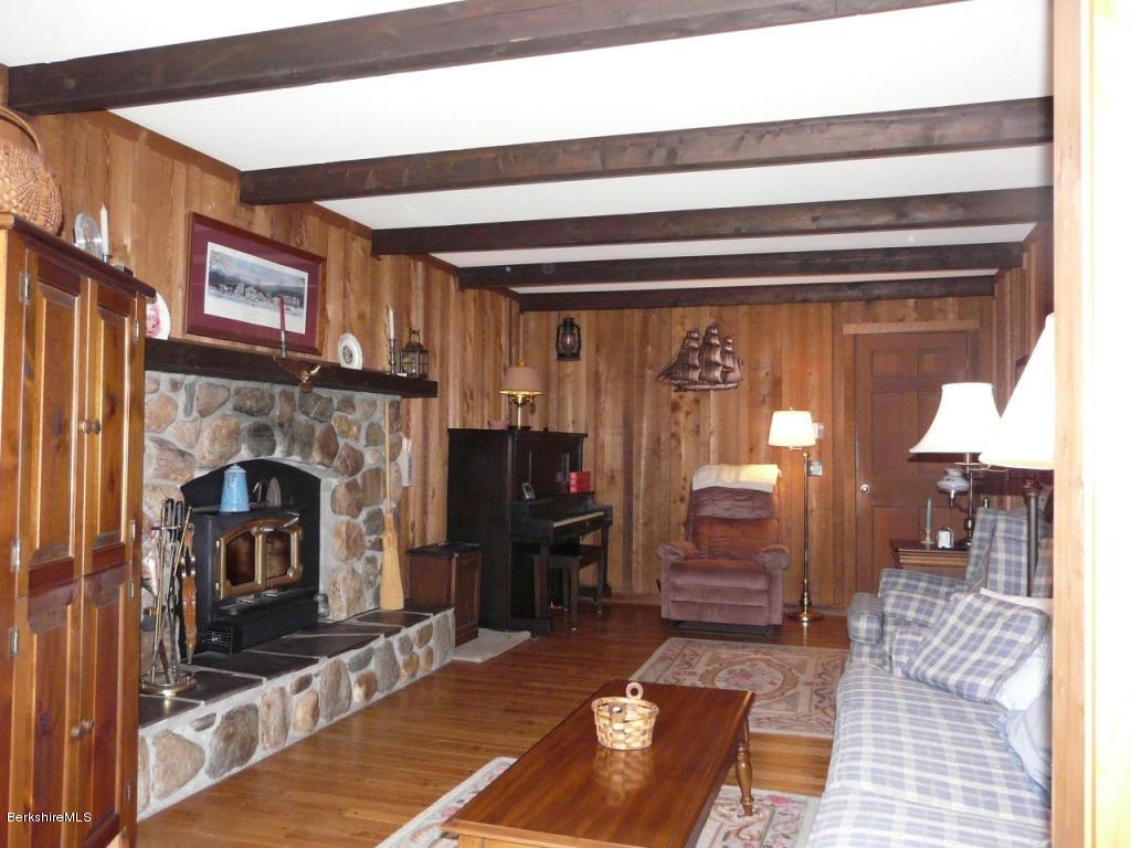 151 Old Post Road Richmond, MA 01201 - Photo 8 of 39 a living room with furniture and a fireplace