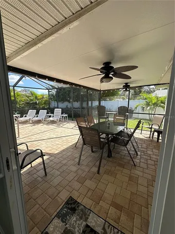 a outdoor space with lots of tables and chairs