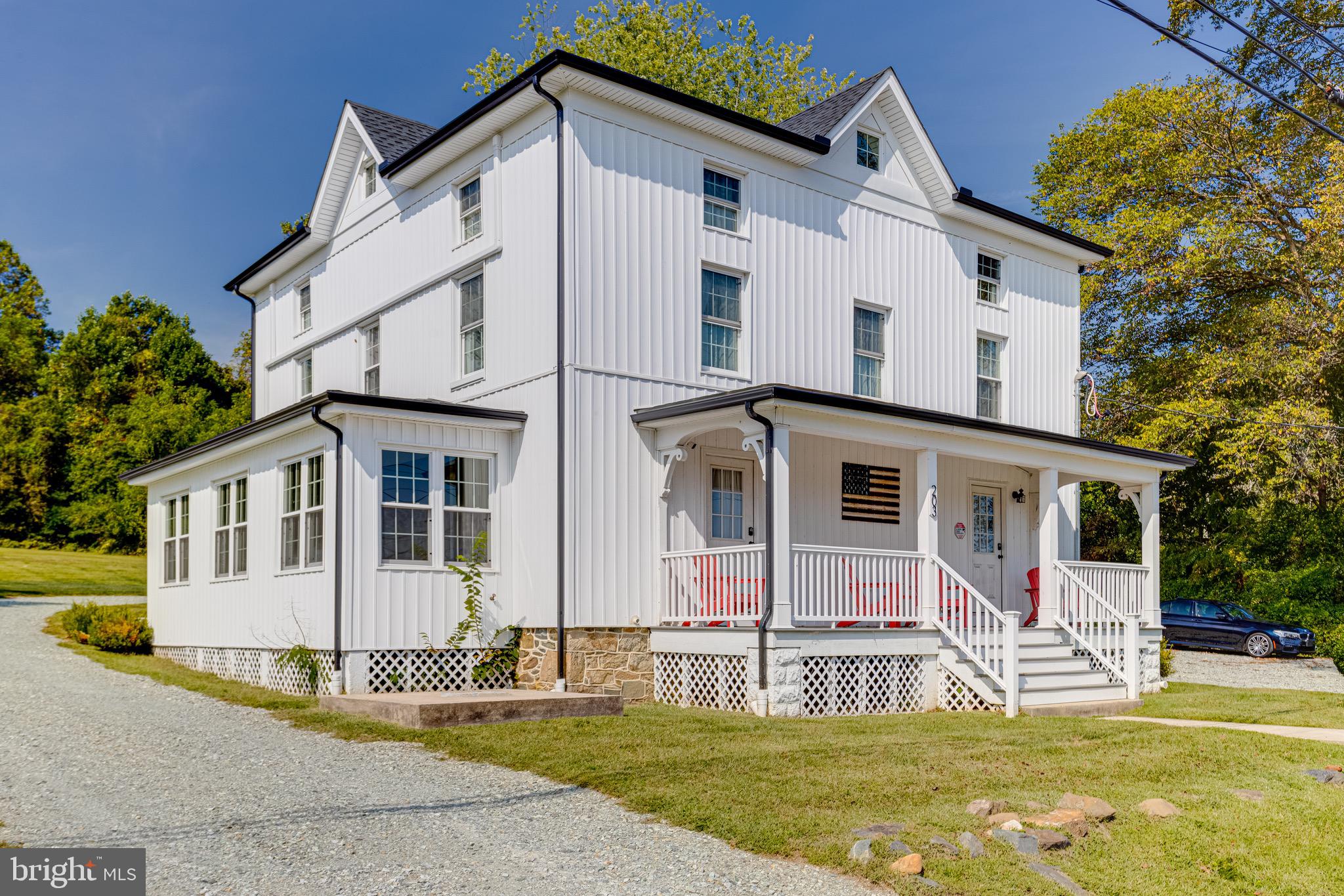 203 Blythedale Road Perryville, MD 21903 - Photo 1 of 104 a front view of a house with a yard