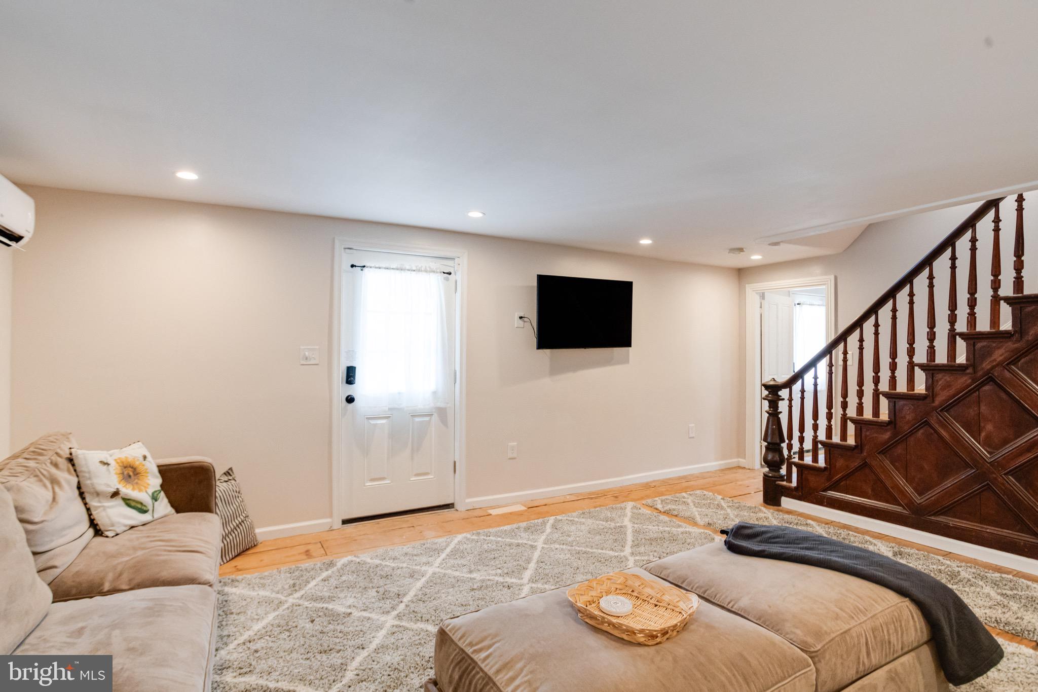 203 Blythedale Road Perryville, MD 21903 - Photo 12 of 104 a bedroom with a bed and a flat screen tv