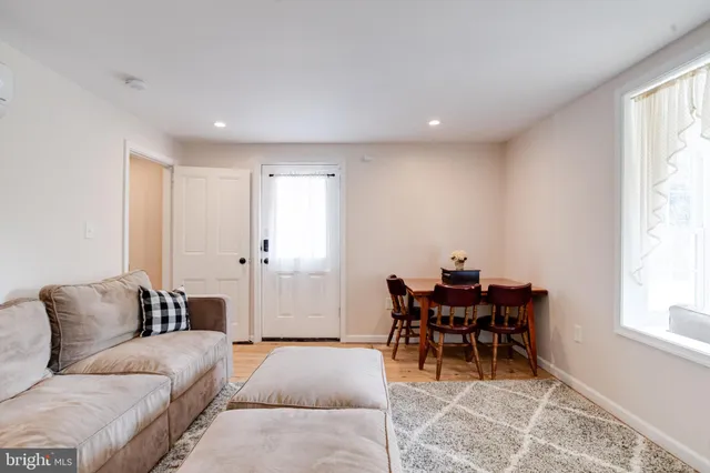 a kitchen with stainless steel appliances a stove a microwave and cabinets