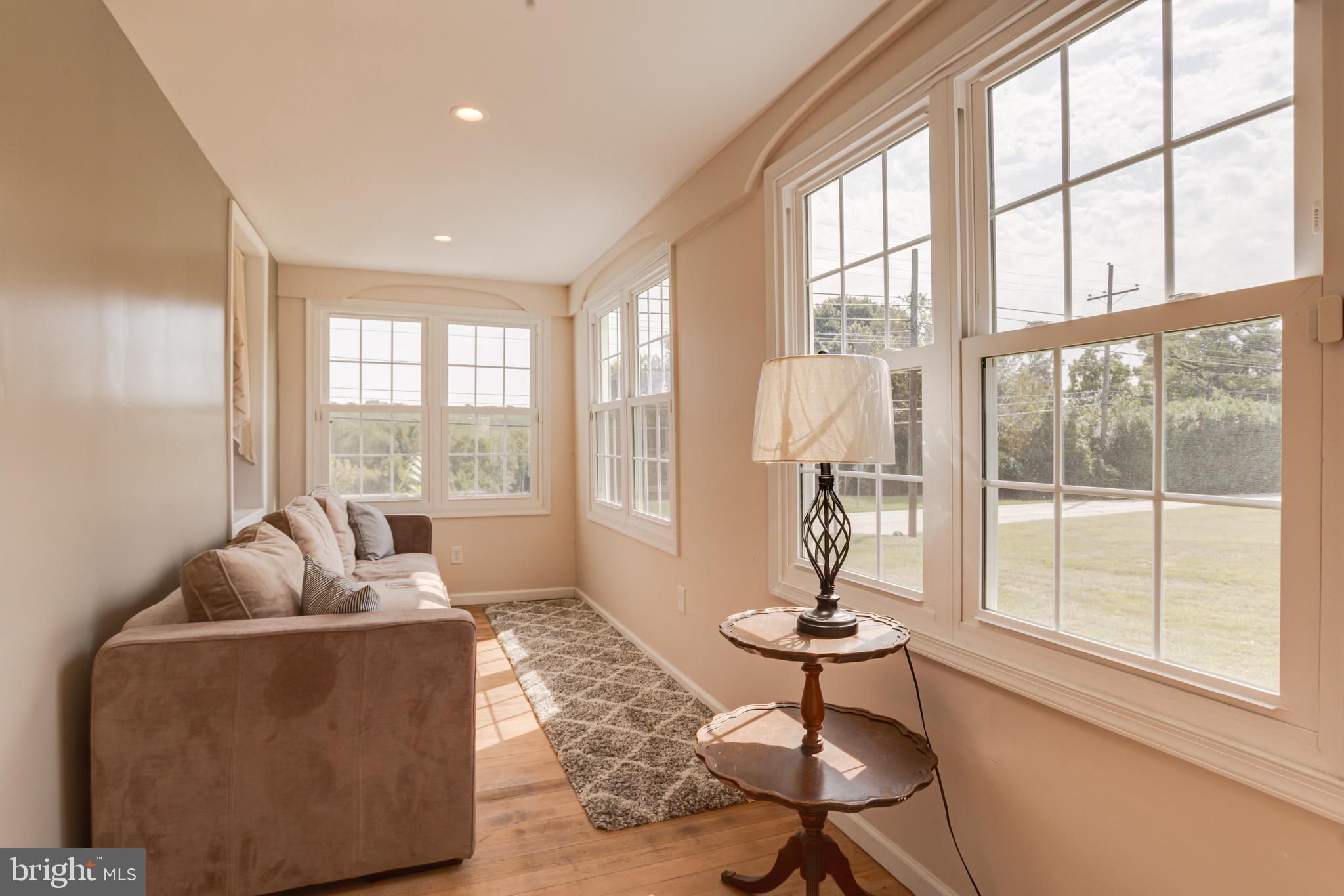 203 Blythedale Road Perryville, MD 21903 - Photo 22 of 104 a living room with furniture and a large window