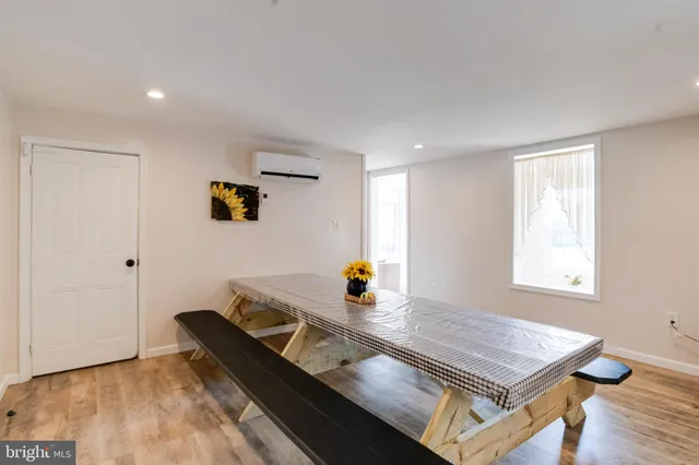 a bedroom with a bed and a lamp