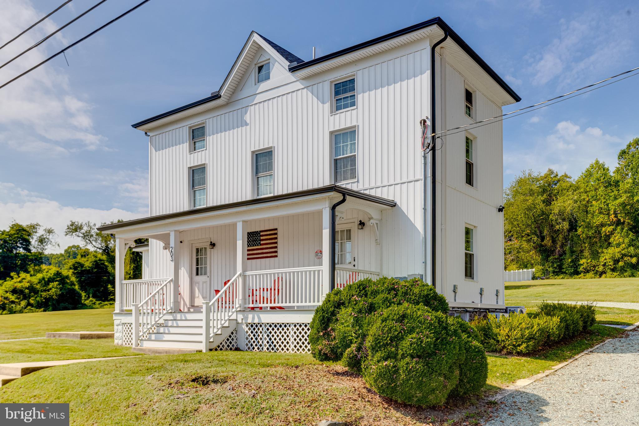 203 Blythedale Road Perryville, MD 21903 - Photo 3 of 104 a front view of a house with a yard