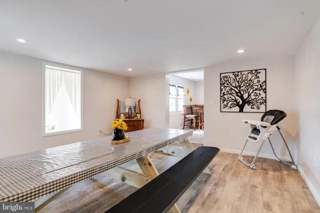 a bedroom with a bed and a mirror