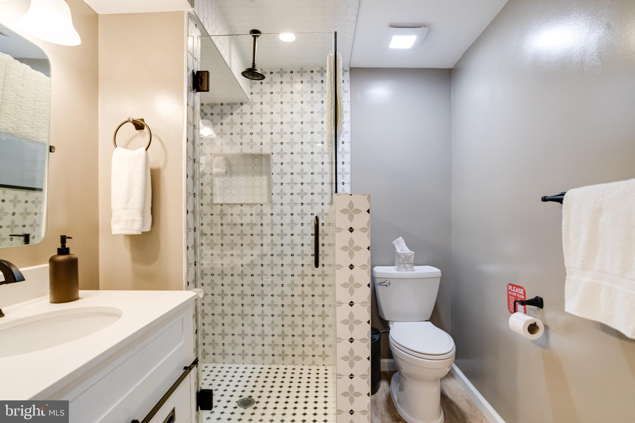 203 Blythedale Road Perryville, MD 21903 - Photo 35 of 104 a bathroom with a sink toilet vanity and shower