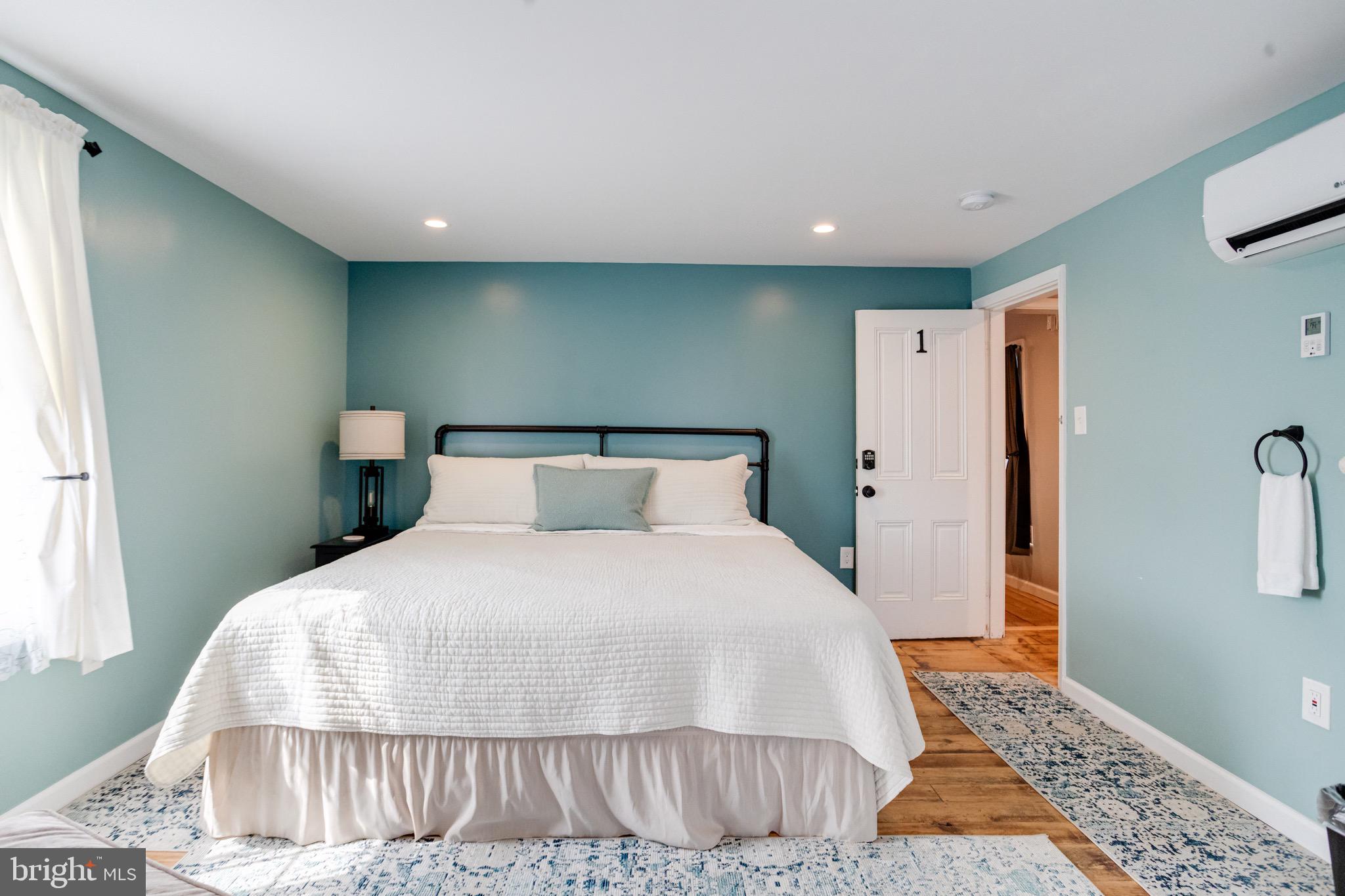 203 Blythedale Road Perryville, MD 21903 - Photo 53 of 104 a large bed sitting in a room next to a window