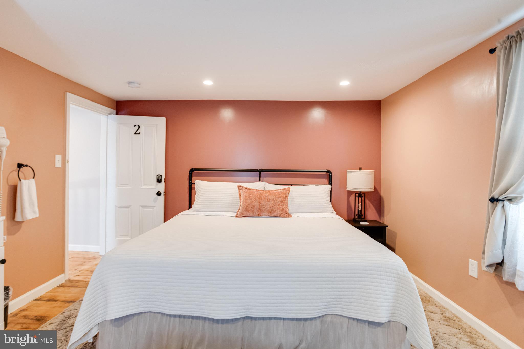 203 Blythedale Road Perryville, MD 21903 - Photo 60 of 104 a large bedroom with a bed and a refrigerator