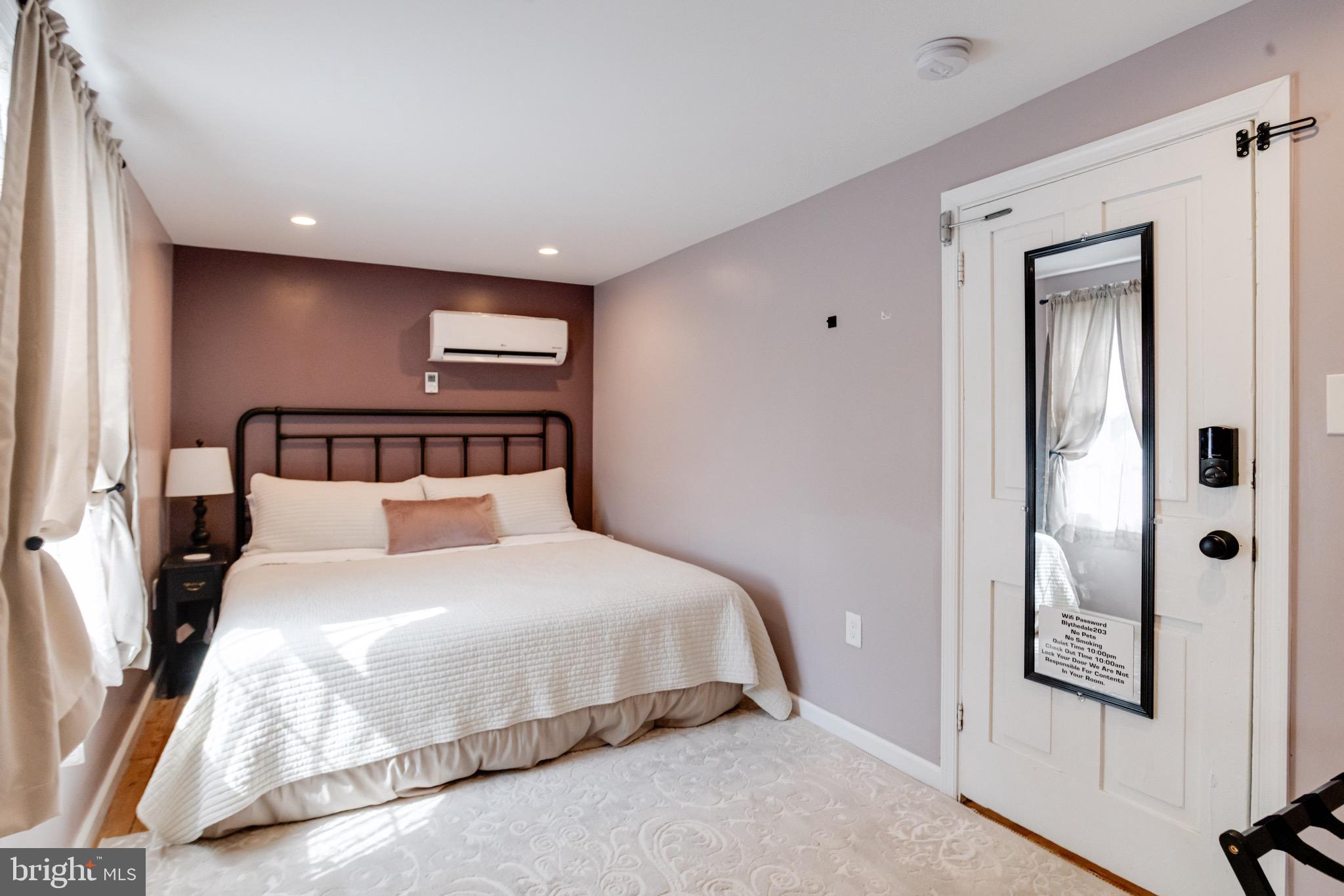 203 Blythedale Road Perryville, MD 21903 - Photo 64 of 104 a bedroom with a bed and a mirror