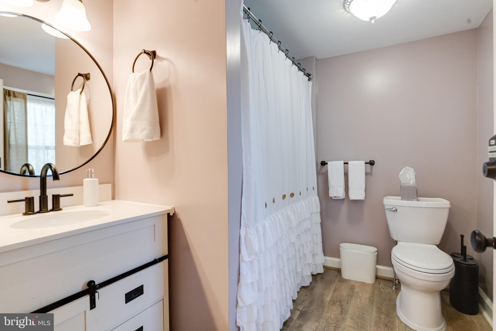 203 Blythedale Road Perryville, MD 21903 - Photo 67 of 104 a bathroom with a toilet sink and mirror