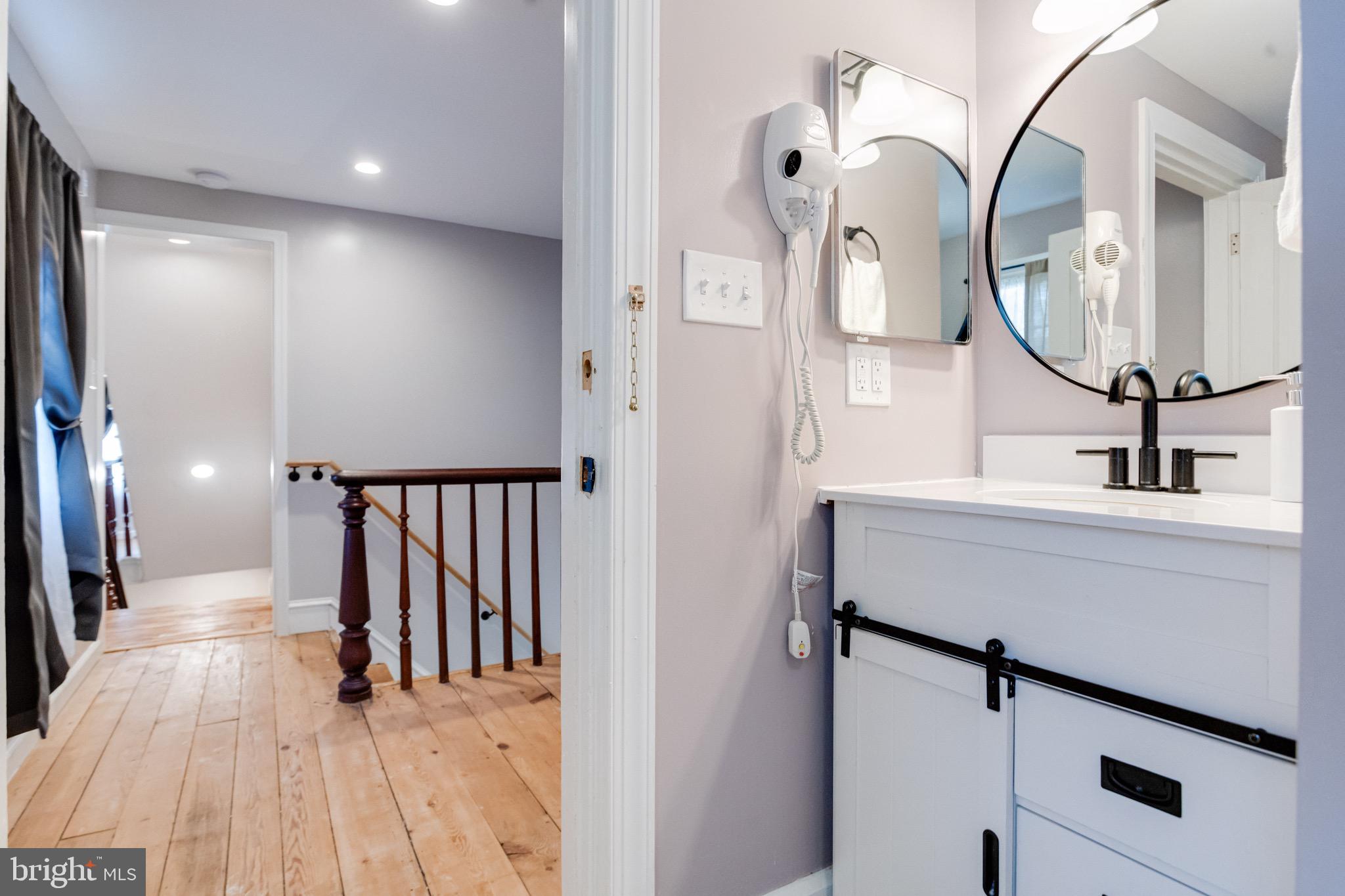 203 Blythedale Road Perryville, MD 21903 - Photo 68 of 104 a bathroom with a sink and a mirror