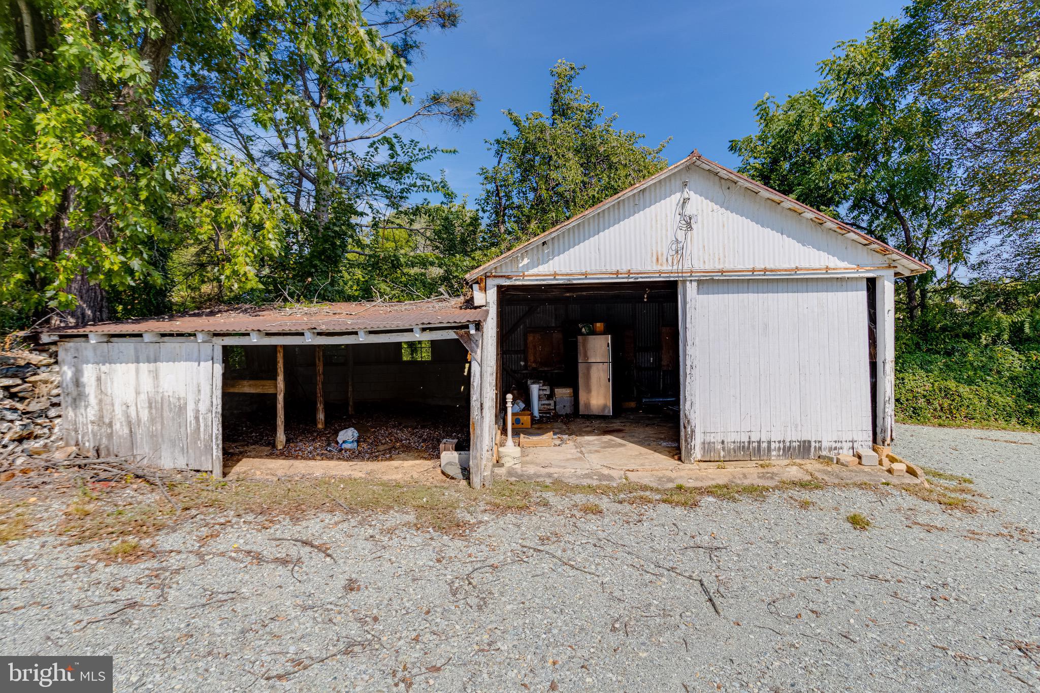 203 Blythedale Road Perryville, MD 21903 - Photo 92 of 104 a view of a house with a yard and garage