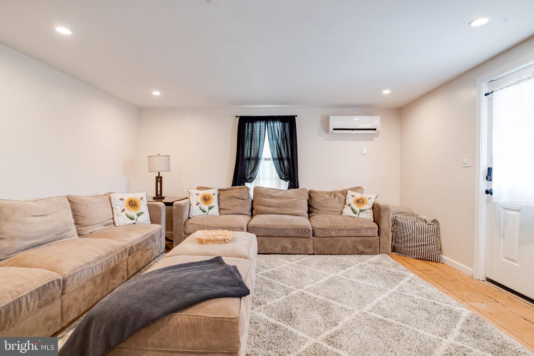 203 Blythedale Road Perryville, MD 21903 - Photo 10 of 104 a living room with a couch and a window