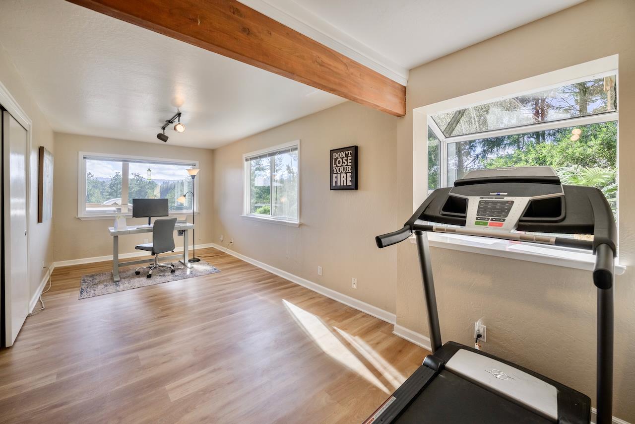 155 Rabbits Run Road Santa Cruz, CA 95060 - Photo 84 of 113 a living room with hardwood floor and a window
