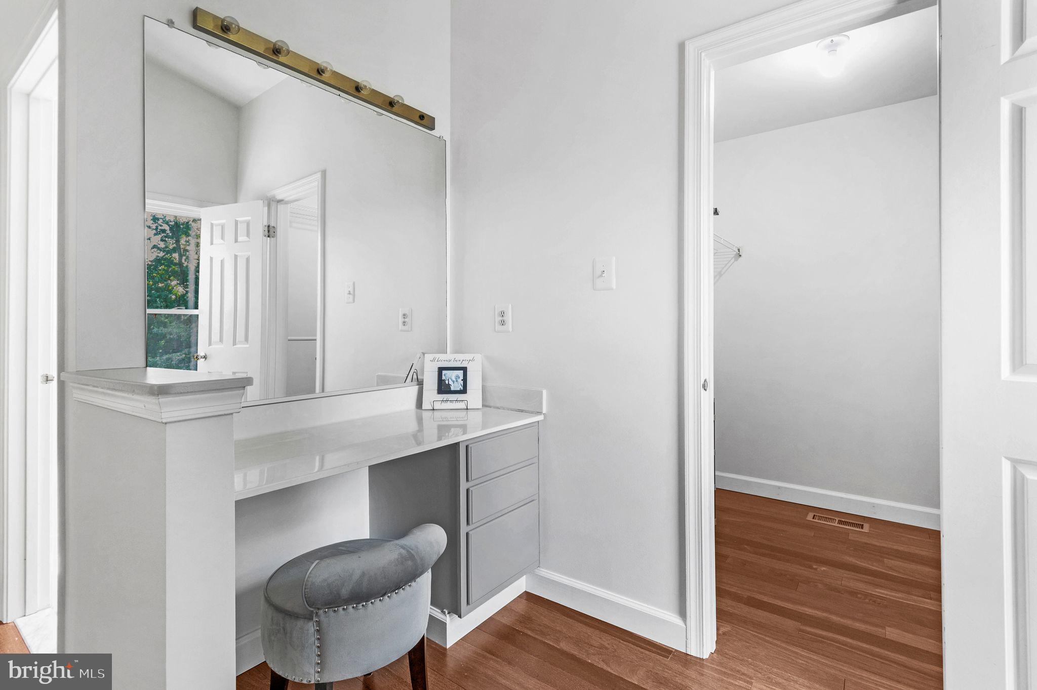 14422 Pebblestone Drive Silver Spring, MD 20905 - Photo 17 of 37 a view of room with wooden floor and chair