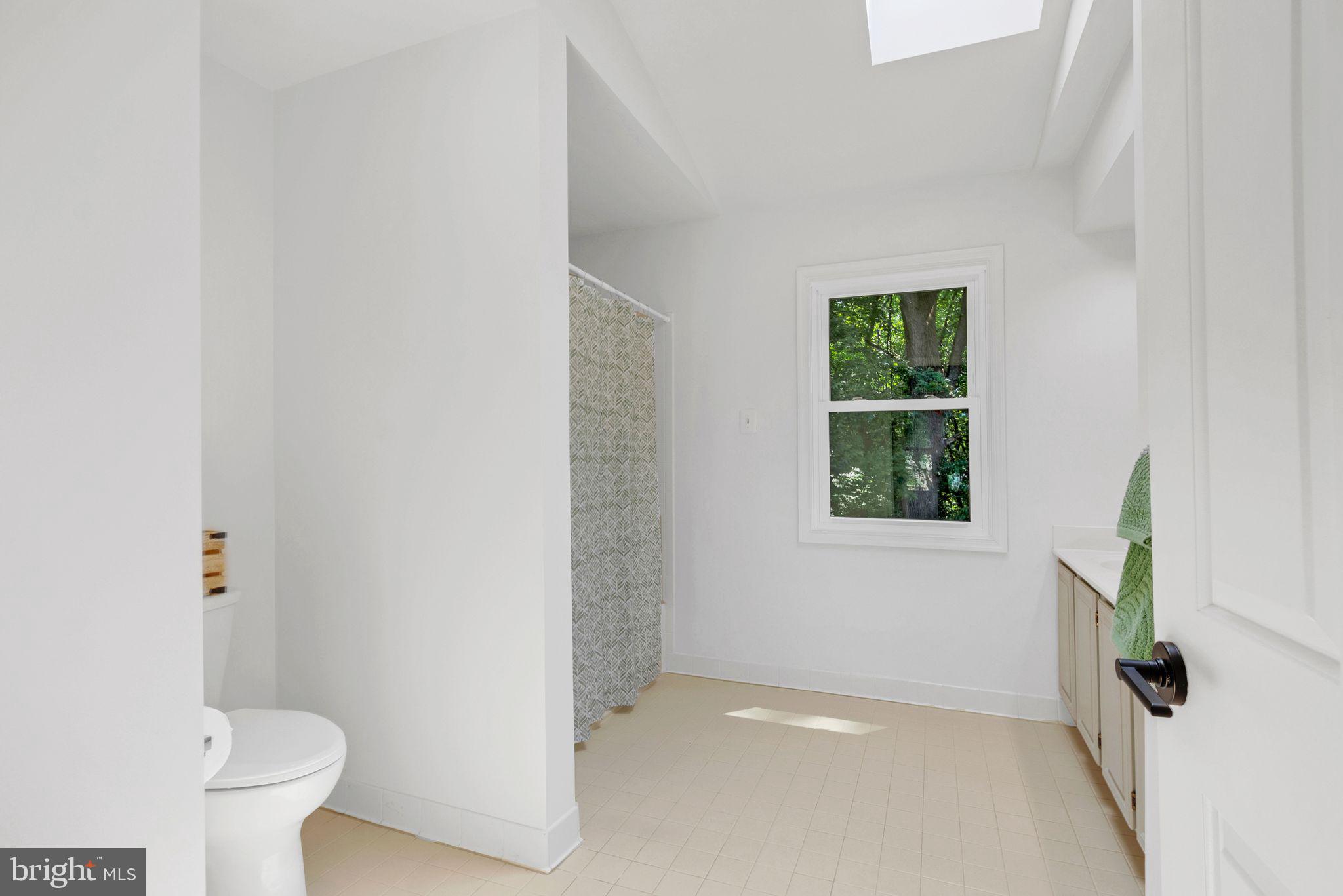 14422 Pebblestone Drive Silver Spring, MD 20905 - Photo 20 of 37 a bathroom with a toilet