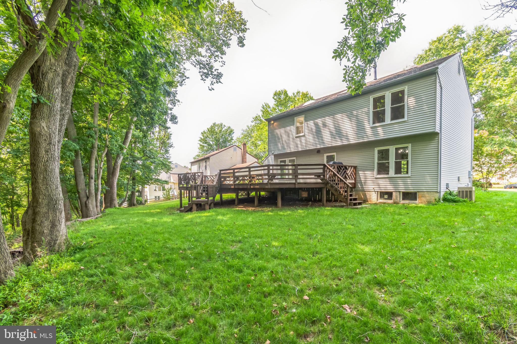 14422 Pebblestone Drive Silver Spring, MD 20905 - Photo 36 of 37 a view of a house with backyard and garden