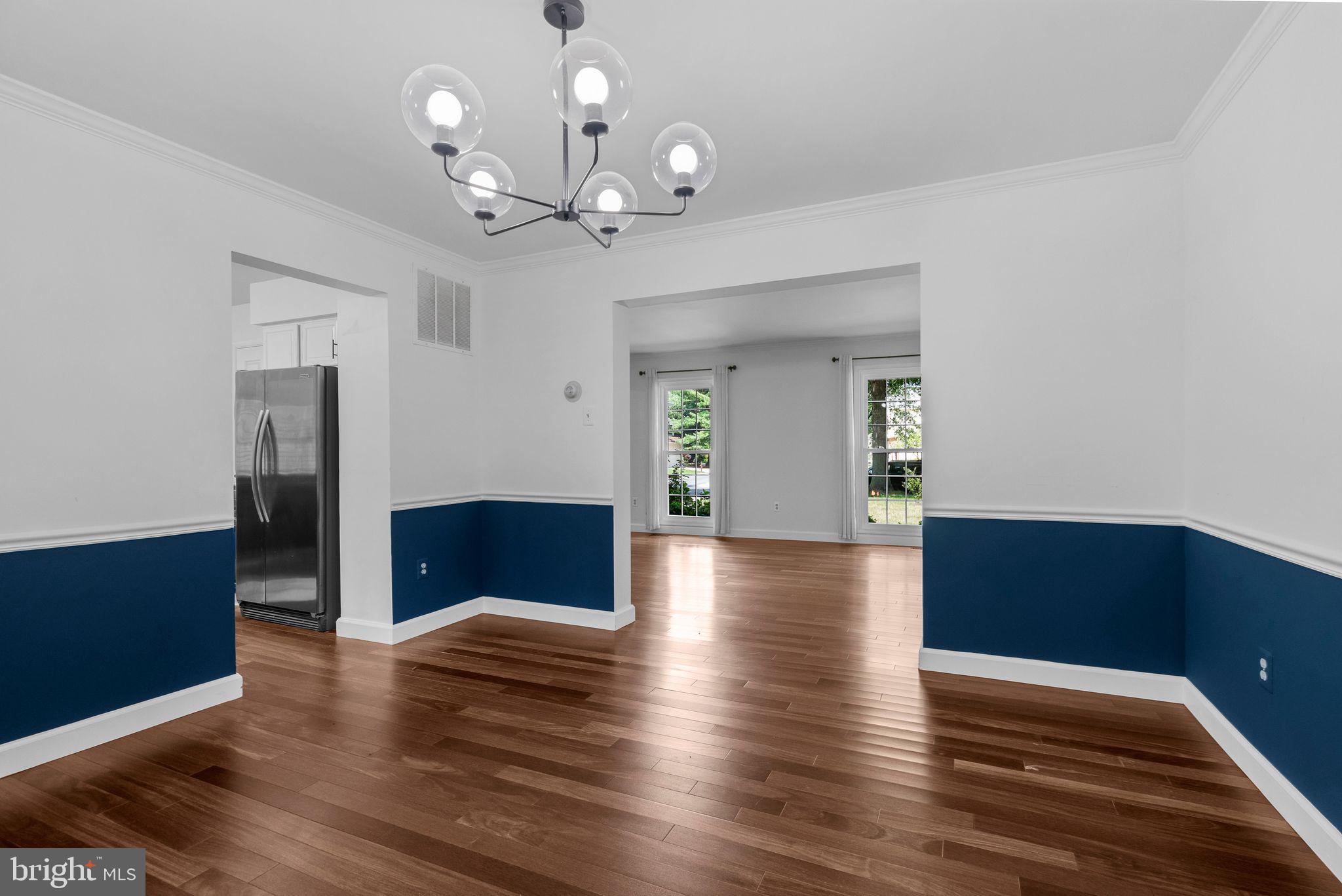 14422 Pebblestone Drive Silver Spring, MD 20905 - Photo 7 of 37 a view of a livingroom with wooden floor