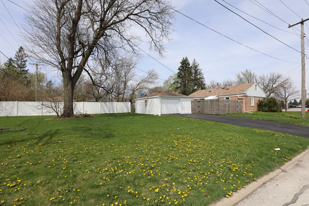 2207 175th Street Homewood, IL 60430 - Photo 13 of 13 a view of yard with grass and trees