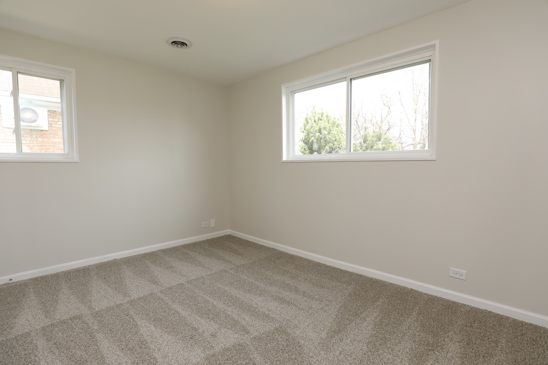 2207 175th Street Homewood, IL 60430 - Photo 9 of 13 an empty room with a window