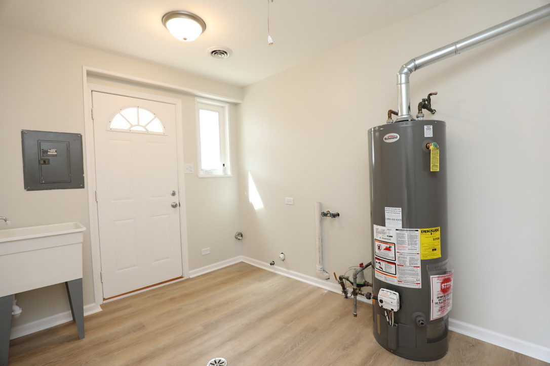 2207 175th Street Homewood, IL 60430 - Photo 10 of 13 a view of an entryway with wooden floor