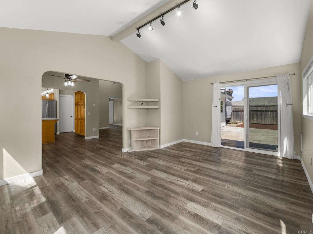 726 Fredricks Avenue Oceanside, CA 92058 - Photo 14 of 38 a view of empty room with wooden floor