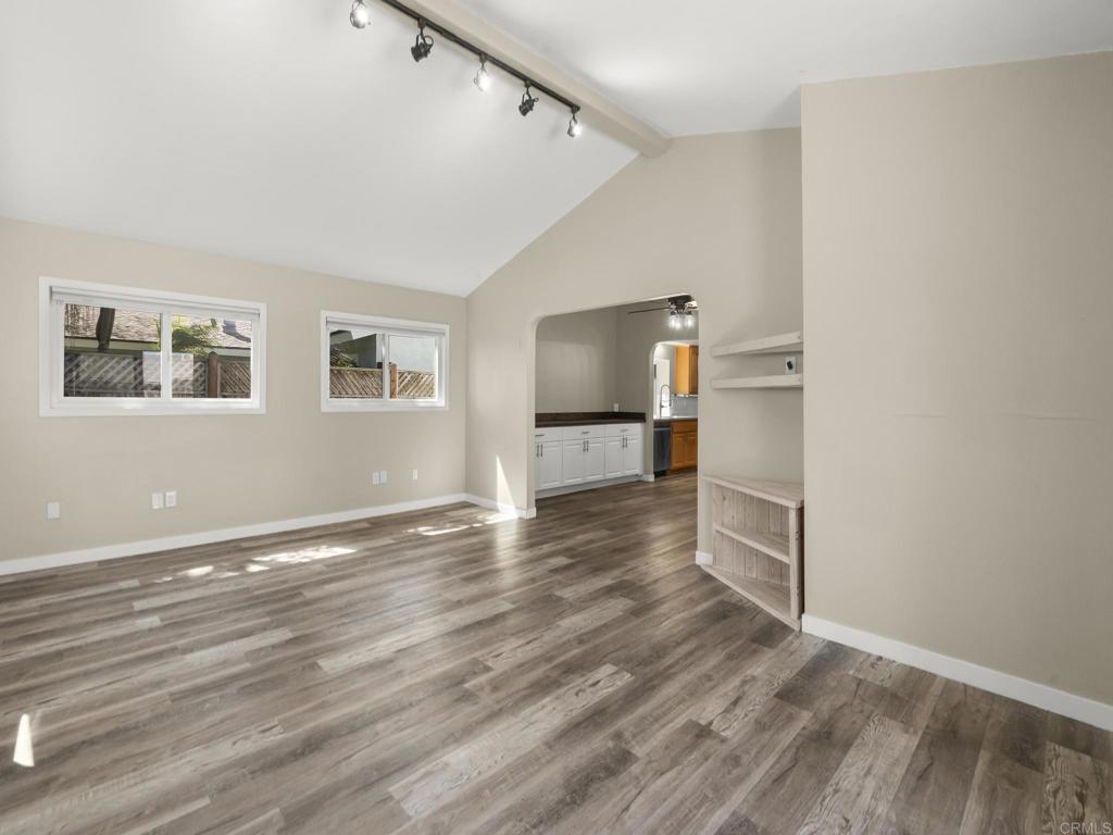 726 Fredricks Avenue Oceanside, CA 92058 - Photo 15 of 38 a view of empty room with wooden floor
