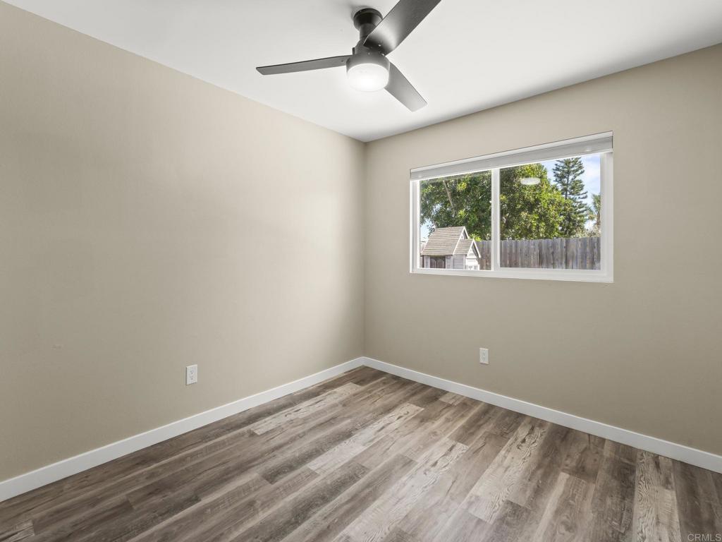 726 Fredricks Avenue Oceanside, CA 92058 - Photo 23 of 38 a view of room with window and ceiling fan