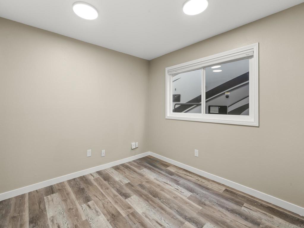 726 Fredricks Avenue Oceanside, CA 92058 - Photo 25 of 38 an empty room with a window