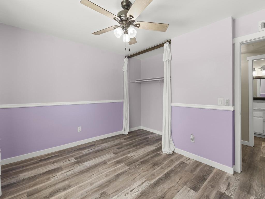 726 Fredricks Avenue Oceanside, CA 92058 - Photo 27 of 38 a view of a livingroom with an empty space and a ceiling fan