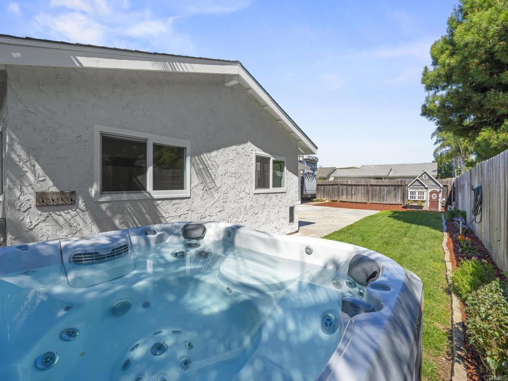 726 Fredricks Avenue Oceanside, CA 92058 - Photo 31 of 38 a view of a house with backyard porch and sitting area