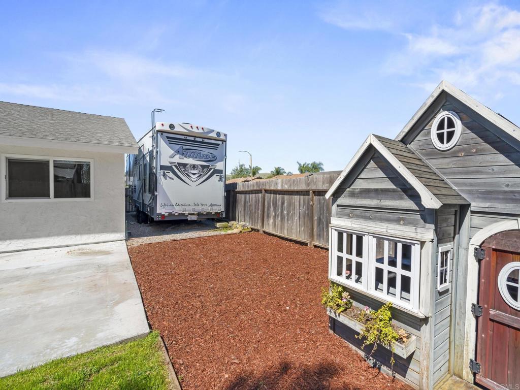 726 Fredricks Avenue Oceanside, CA 92058 - Photo 33 of 38 a front view of a house with parking space
