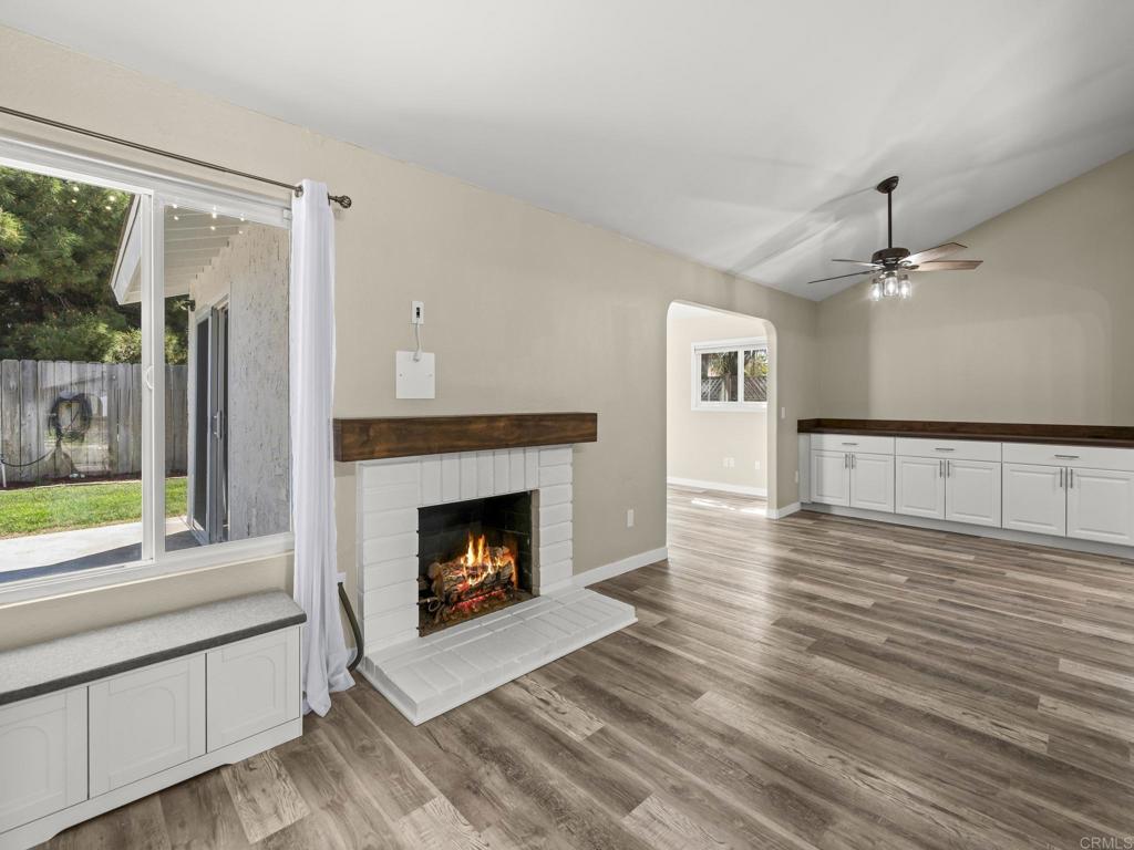 726 Fredricks Avenue Oceanside, CA 92058 - Photo 5 of 38 a living room with furniture and a fireplace