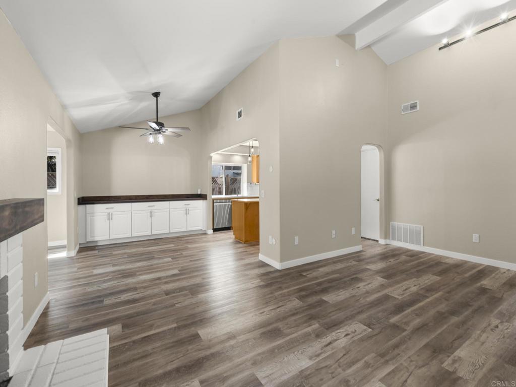 726 Fredricks Avenue Oceanside, CA 92058 - Photo 6 of 38 a view of a kitchen with a sink and a wooden floor
