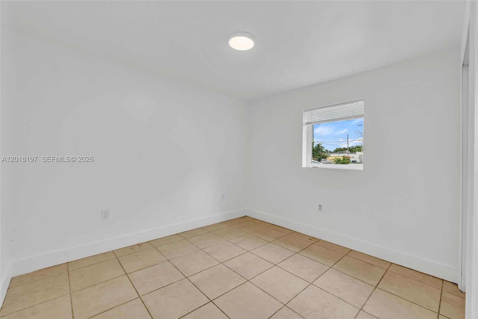 628 Southwest 8th Avenue Homestead, FL 33030 - Photo 11 of 25 a view of a room with wooden floor