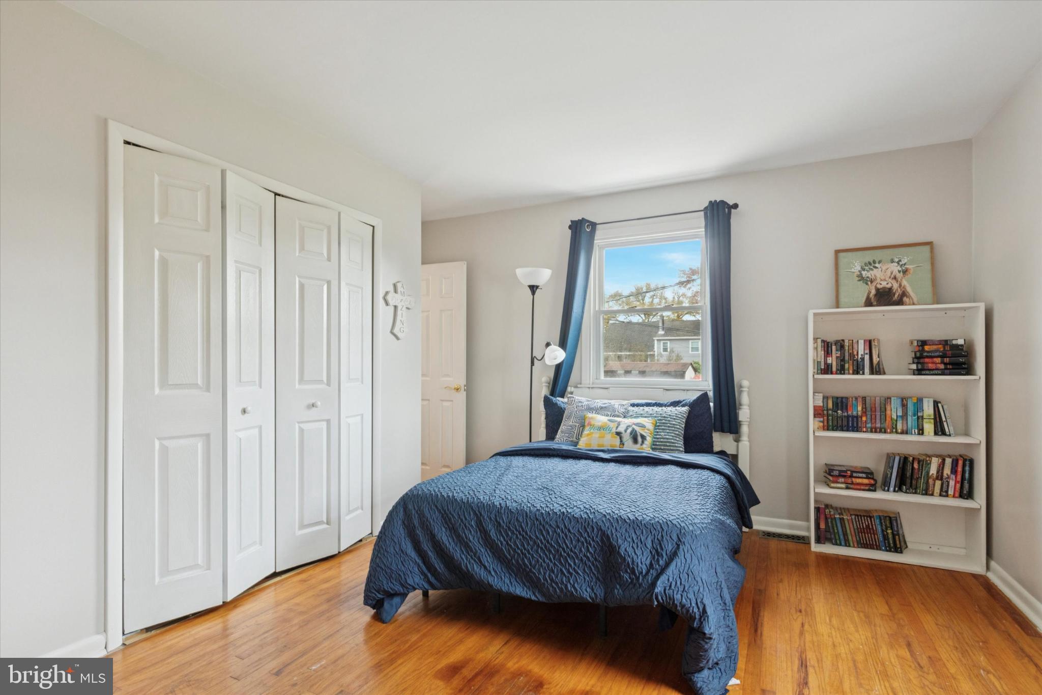 108 Devon Road Chalfont, PA 18914 - Photo 15 of 30 a spacious bedroom with a bed and a bookshelf