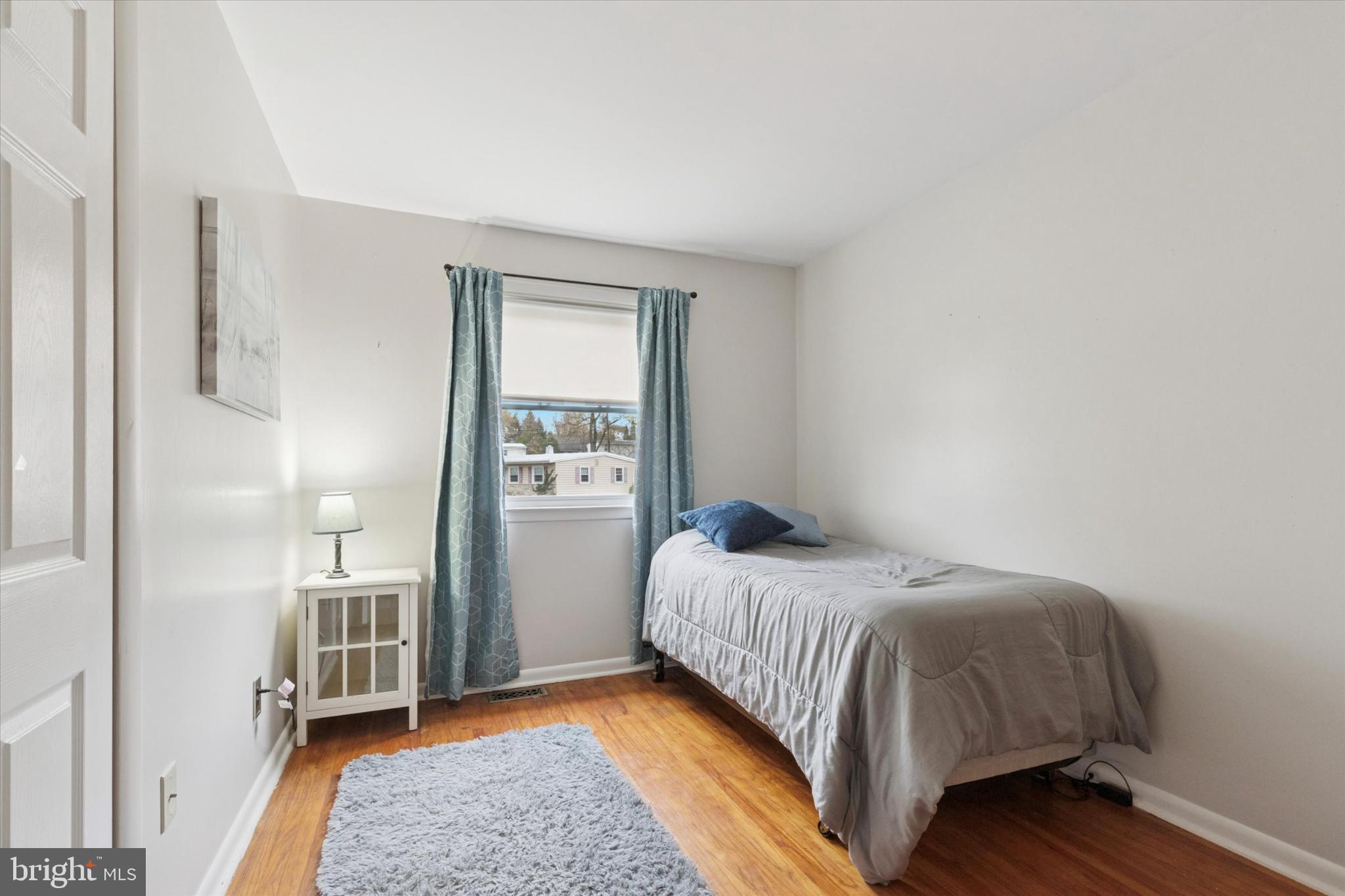 108 Devon Road Chalfont, PA 18914 - Photo 18 of 30 a bedroom with a bed and a window