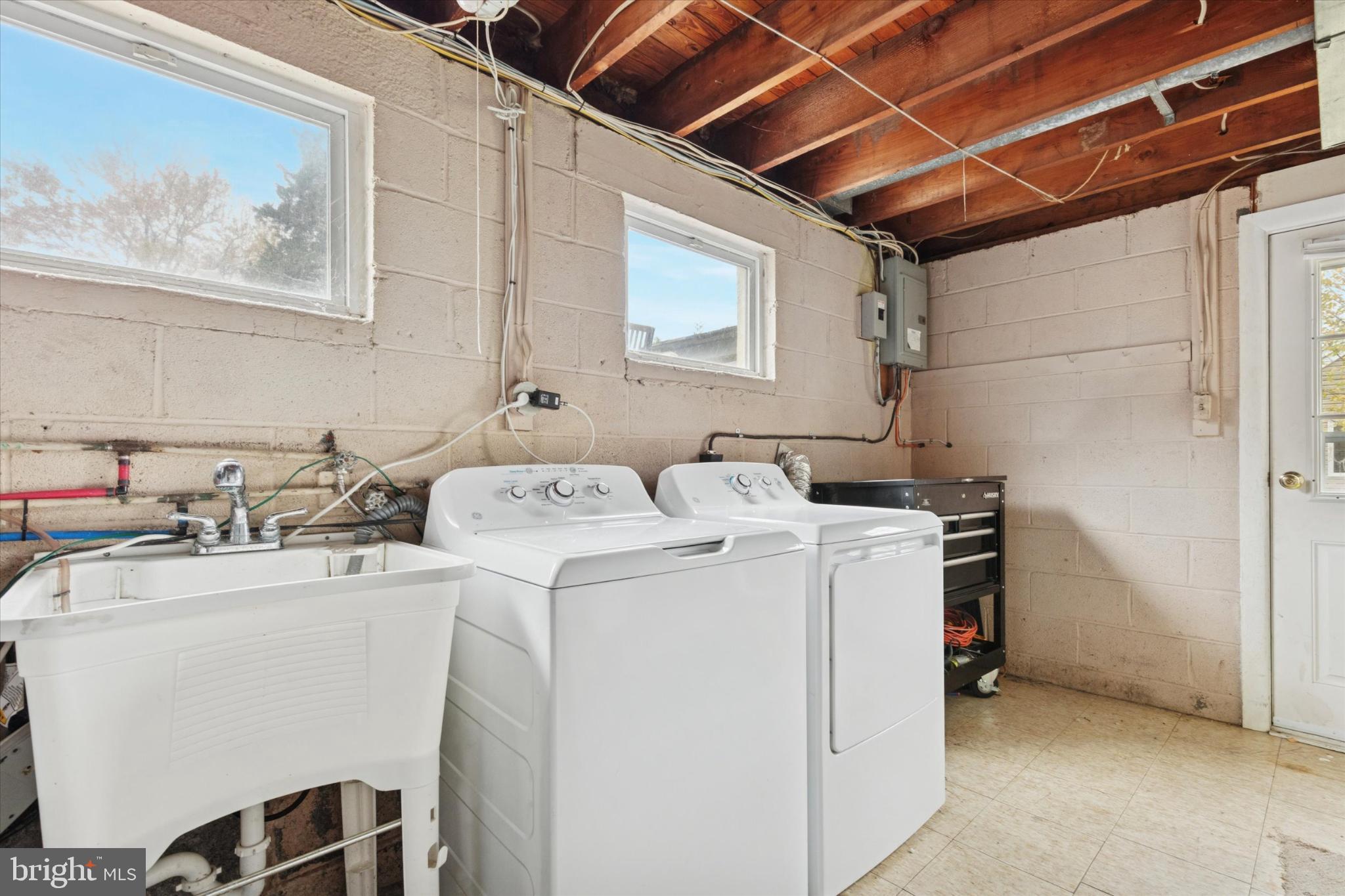 108 Devon Road Chalfont, PA 18914 - Photo 22 of 30 a utility room with dryer and washer