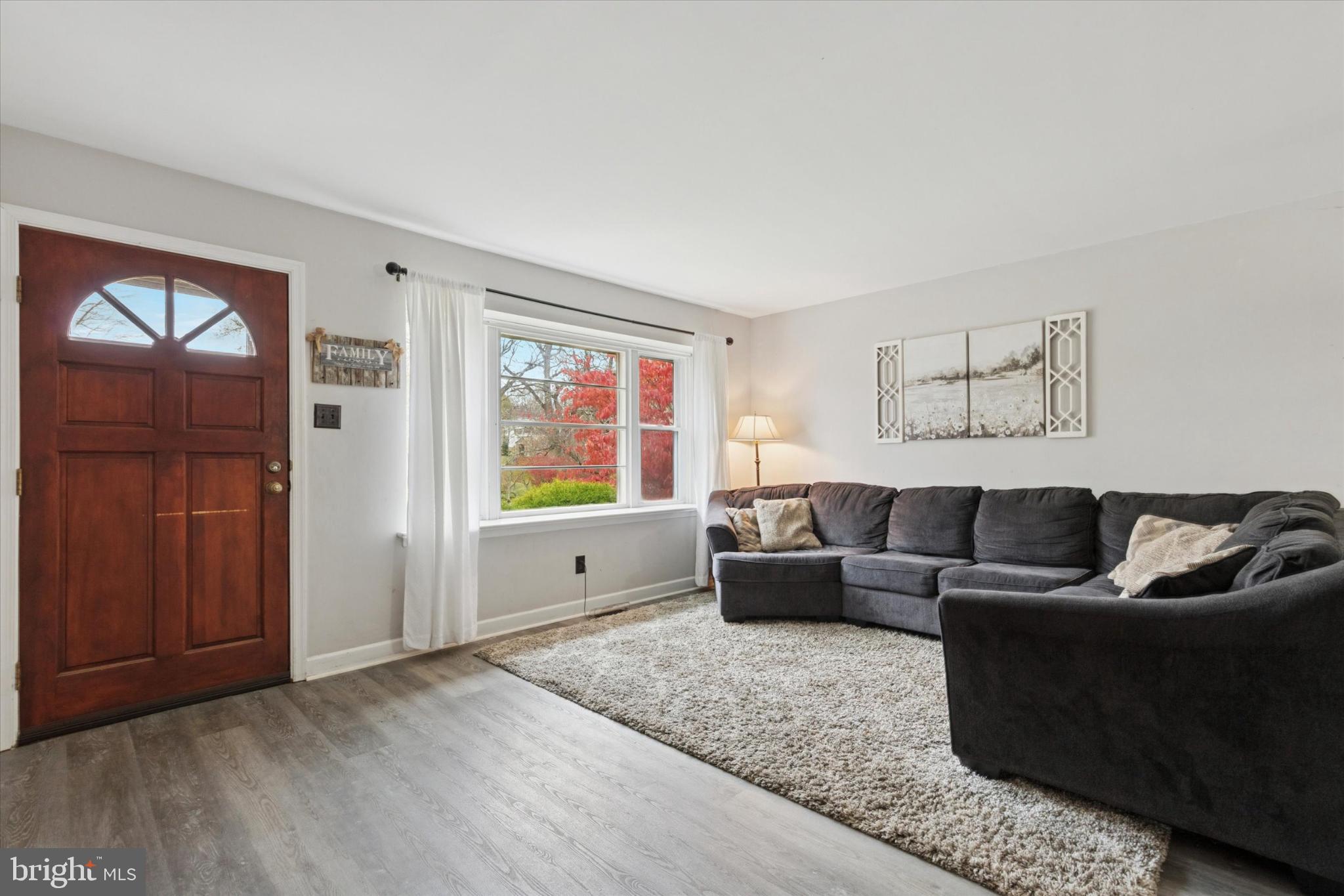 108 Devon Road Chalfont, PA 18914 - Photo 3 of 30 a living room with furniture and a window