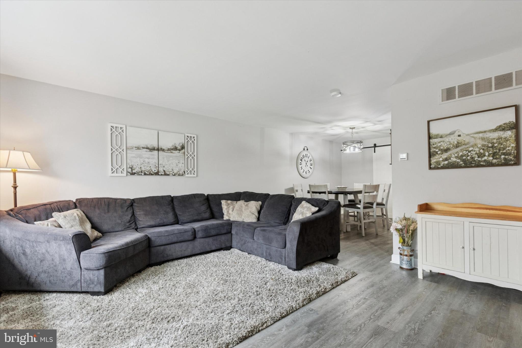 108 Devon Road Chalfont, PA 18914 - Photo 4 of 30 a living room with furniture and a wooden floor
